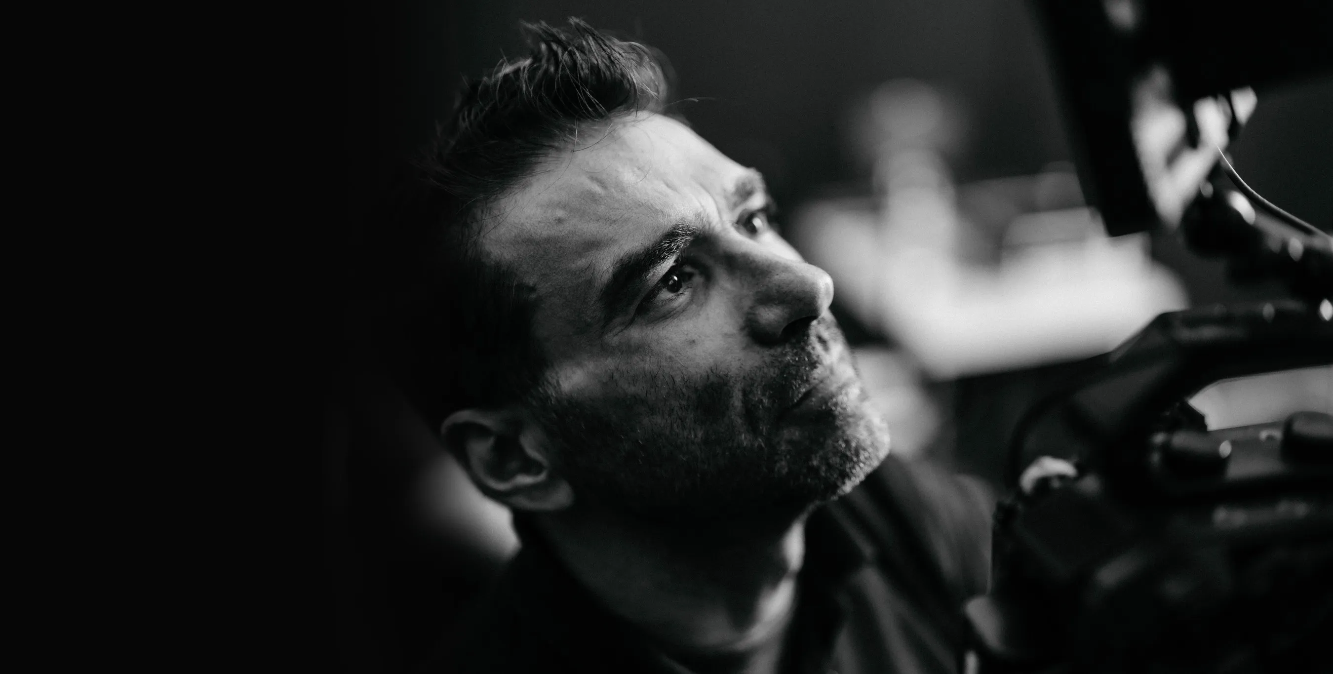 Matteo Castelli, Director of Photography, on set with a cinema camera